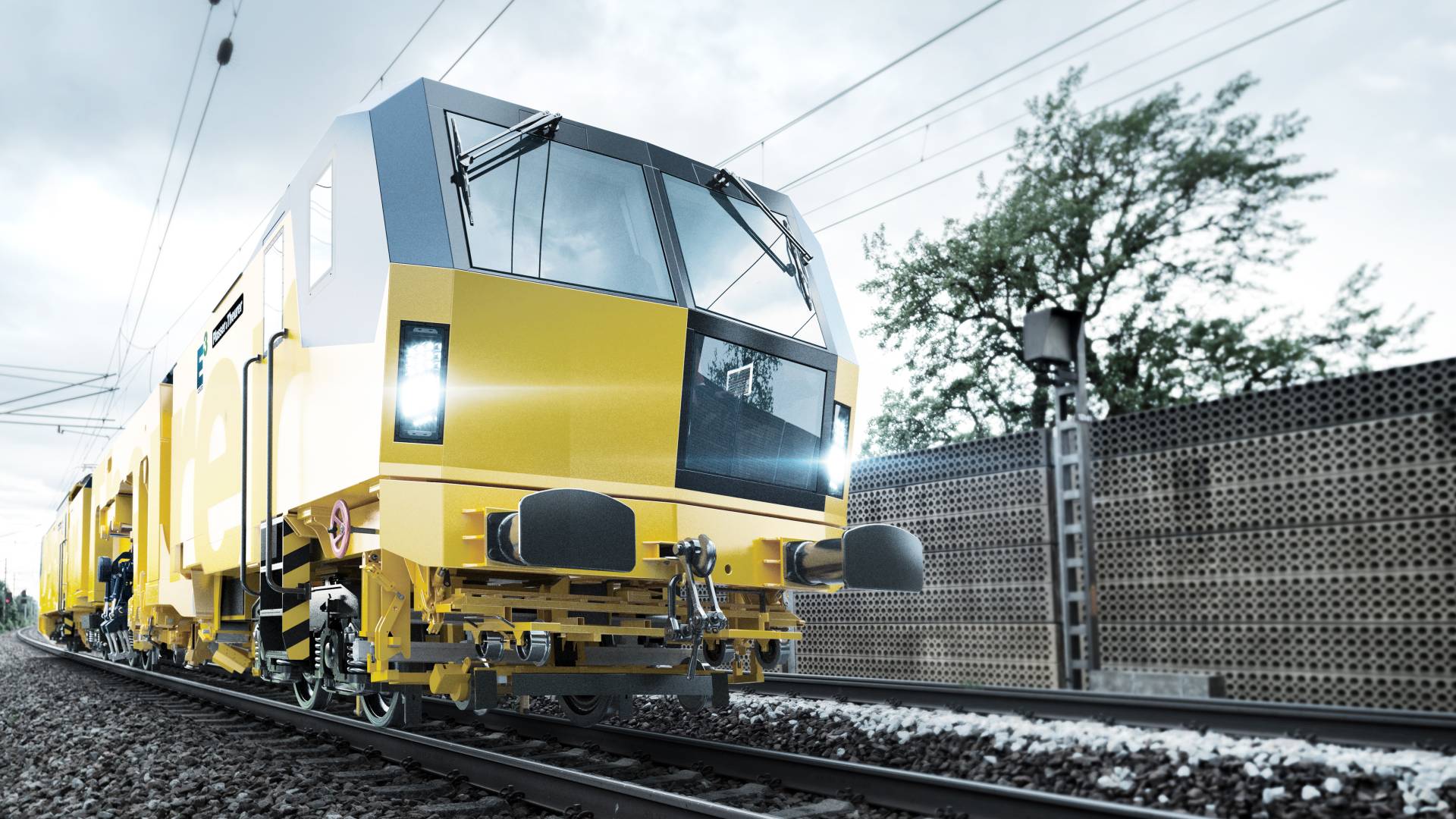 Plasser & Theurer Stopfmaschine Eine Plasser & Theurer Stopfmaschine auf Gleisen